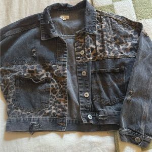 Distressed denim jacket with cheetah print details